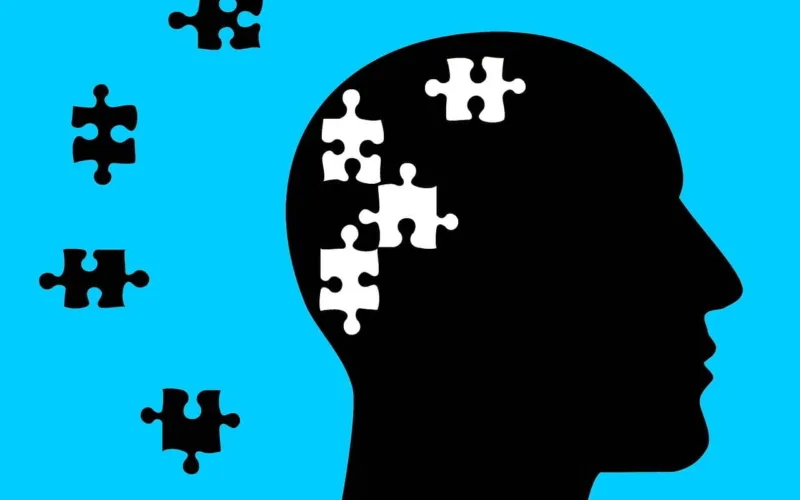 Medicina psicosomatica: imagen de cabeza con puzle